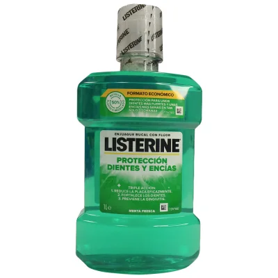 Listerine mouthwash 1 l. Fresh mint triple action teeth and gums.