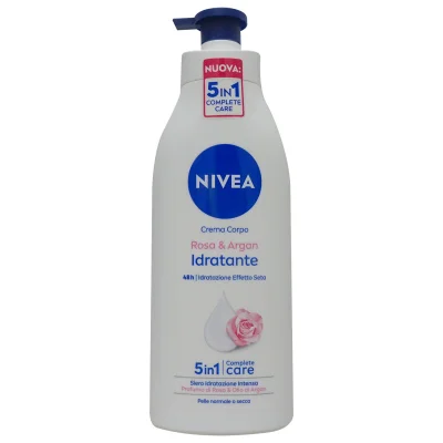Nivea body milk 500 ml. Hydrating argan oil & rose perfume normal & dry skin 5 in 1 with dispenser.